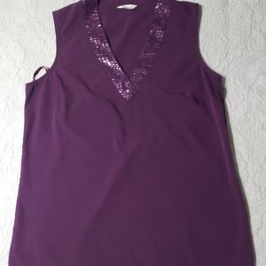 Purple sleeveless blouse
